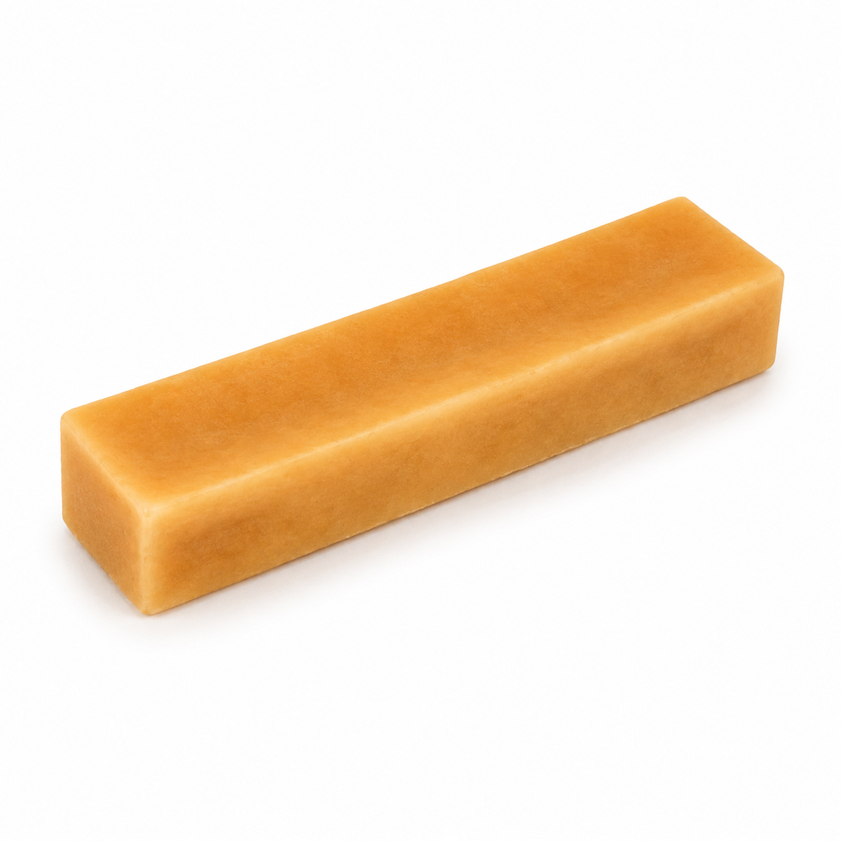 A single natural yak cheese chew for dogs on a white background